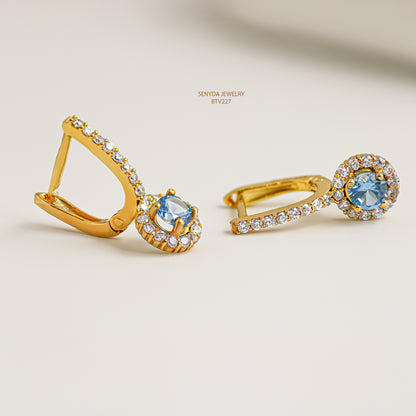 "Senyda 10K Solid Gold Halo English Lock Earrings" - Elevate your style with these exquisite 10K gold halo earrings featuring an elegant English lock design.