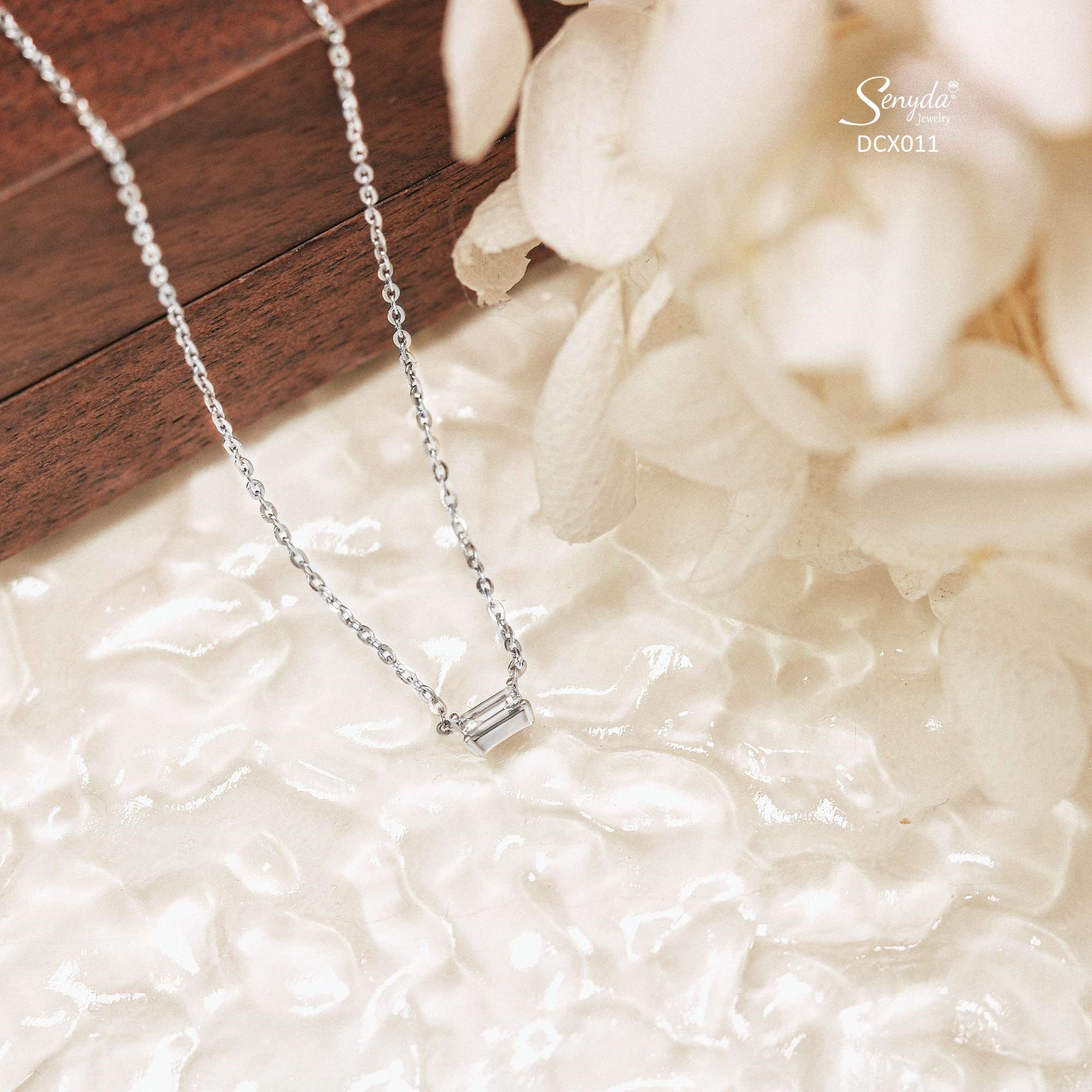 Halskette aus 14 Karat massivem Gold mit Baguette Diamanten und 4 zack