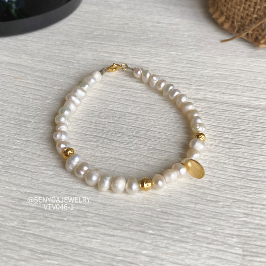 Senyda 10K Gold Freshwater Pearls 4,5x5mm Bracelet With Roundtag And Beads